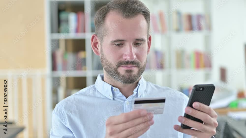 Portrait of Online Payment Success on Smartphone by Man Portrait of Online Payment Success on Smartphone by Man