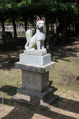 Sculpture of a Japanese fox in Nara Park.