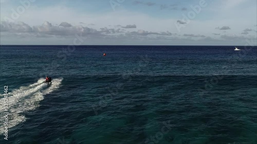 Wallpaper Mural Aerial point of view, life guard on jet ski performing rescue operation off the coast of Philippines, in crystal clear, slow motion Torontodigital.ca