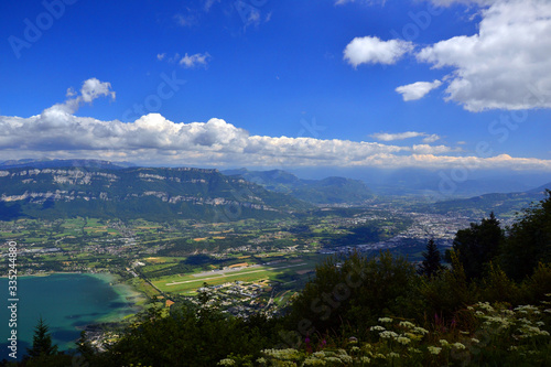 View of the end of the Bourget Lake, a part of the cities of Le Bourget du lac and Aix-les-bains (on left), and the city of Chambéry on right.