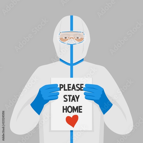 Doctor in protective suits with sign Please stay home