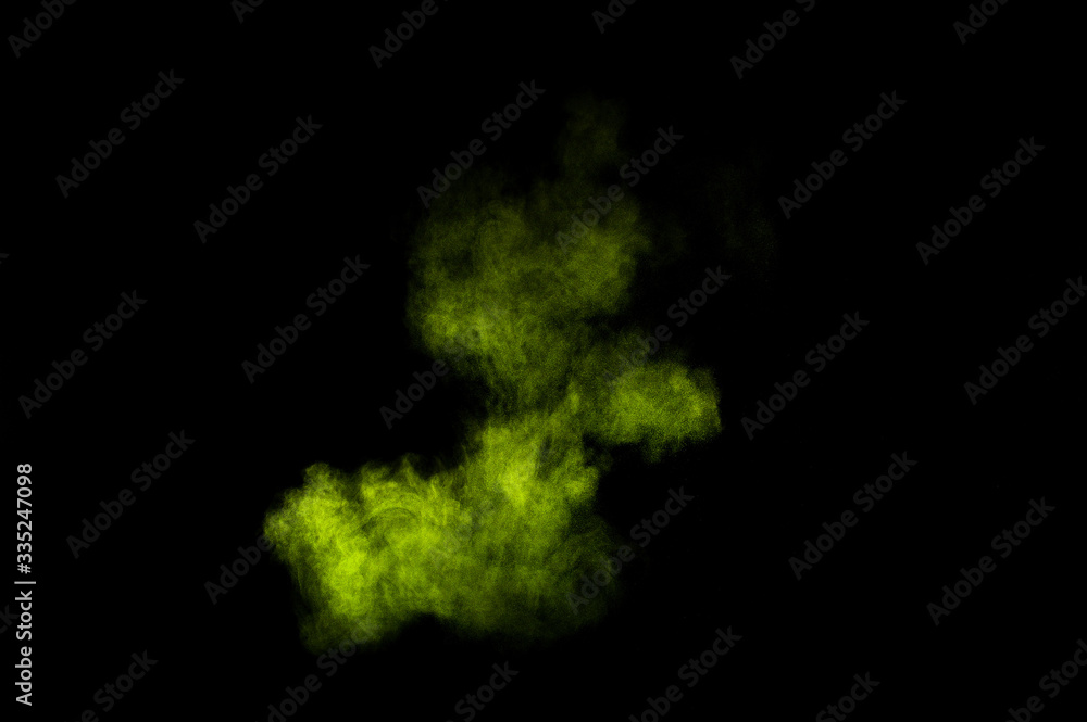Light green powder explosion on black background. Colored powder cloud. Colorful dust explode. Paint Holi. Light green powder explosion on black background. Colored powder cloud. Colorful dust explode. Paint Holi.