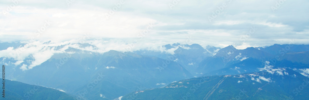 Landscape from the heights of the mountains. Panorama. Photowall-paper.