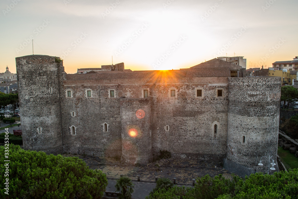 Catania, Sicily in Italy. Aerial view of the Ursino castel at dawn. Is an old medieval castle built at the time of Frederik the second of Swabia from the thirteenth century now converted in a museum