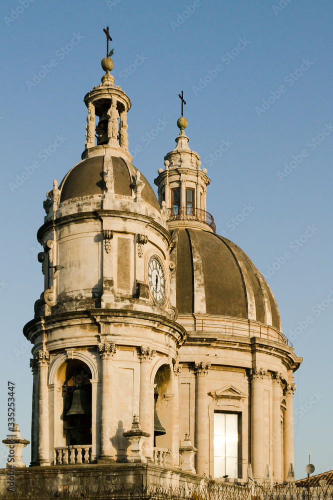 Catania, Sicily in Italy. View of the cathedral dome at sunset. This beautiful church is located in the heart of the city and its called Sant'Agata. The view is from the Badia a little church nearby
