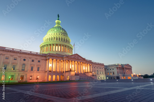 The United States Capitol building at night in Washington DC, United States of America 