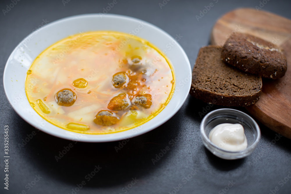Meatball soup. Top view, copy space. Flavored, delicious soup on your table Meatball soup. Top view, copy space. Flavored, delicious soup on your table
