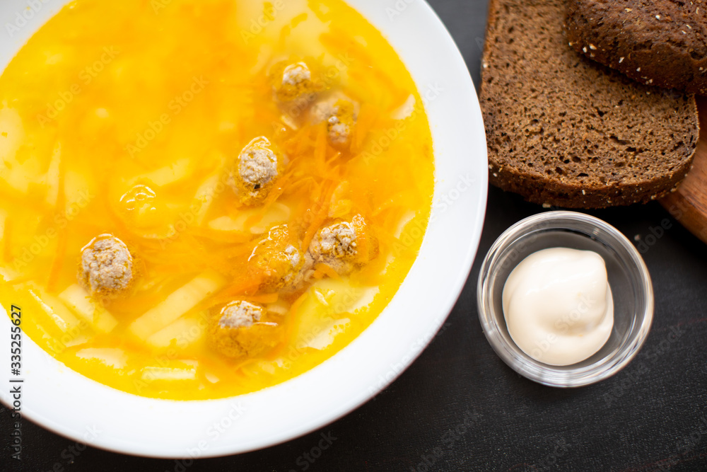 Meatball soup. Top view, copy space. Flavored, delicious soup on your table Meatball soup. Top view, copy space. Flavored, delicious soup on your table