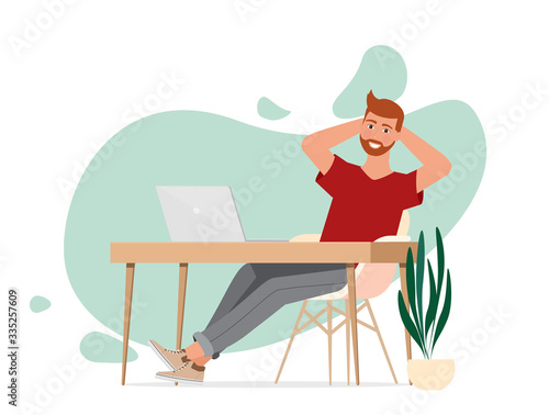 The man leaned back in his chair in front of the computer.