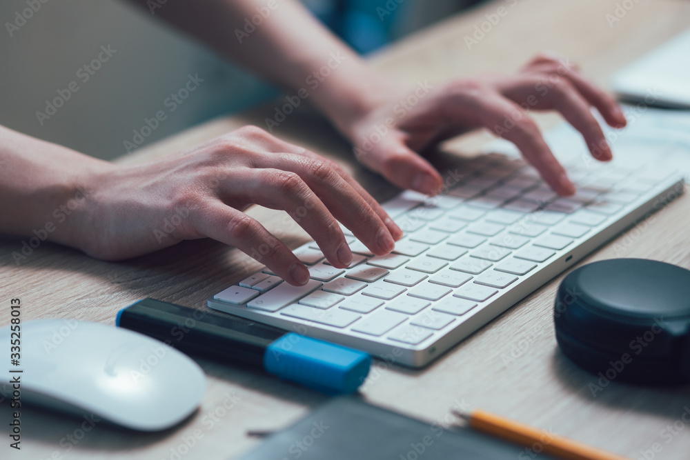 Person working and using modern wireless keyboard Person working and using modern wireless keyboard