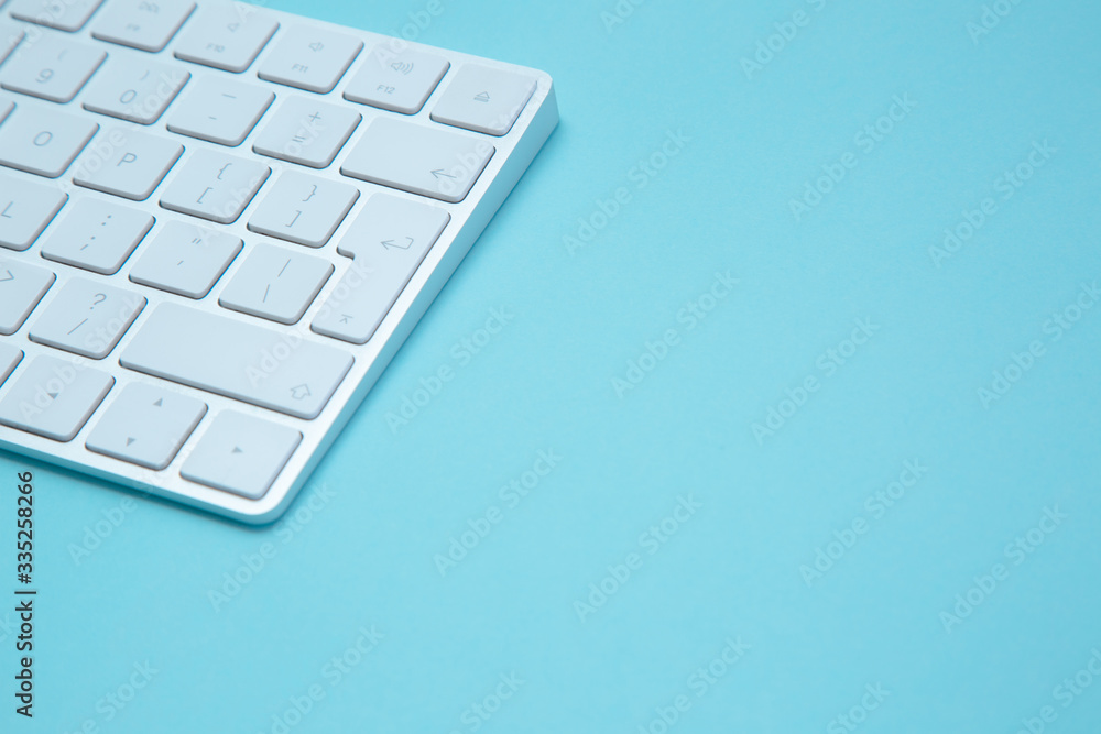 Blue background with part of keyboard stock photo Blue background with part of keyboard stock photo