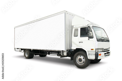 White heavy truck with cargo container photo