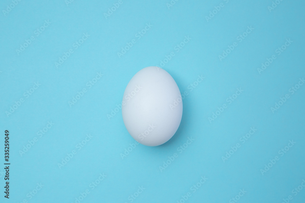 White egg in the middle of horizontal photo stock photo White egg in the middle of horizontal photo stock photo