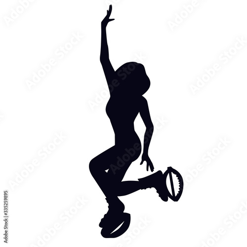 Female silhouette doing grape wine exercise in kangoo jump boots. Girl dancing in bounce shoes during high intensity interval training HIIT. Cardio fitness and weight loss. Gaining good shape.