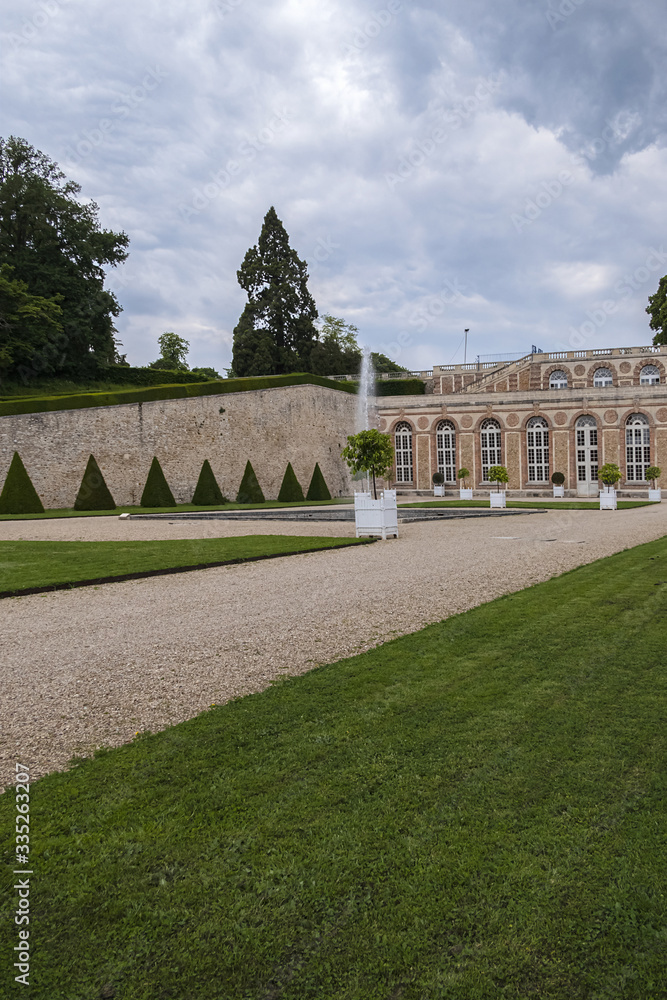 Obraz premium Picturesque Orangery (L'Orangerie de Meudon, XVII century) in Meudon. The Orangery - remain of the former old castle of Meudon. Meudon is a municipality in the southwestern suburbs of Paris, France.