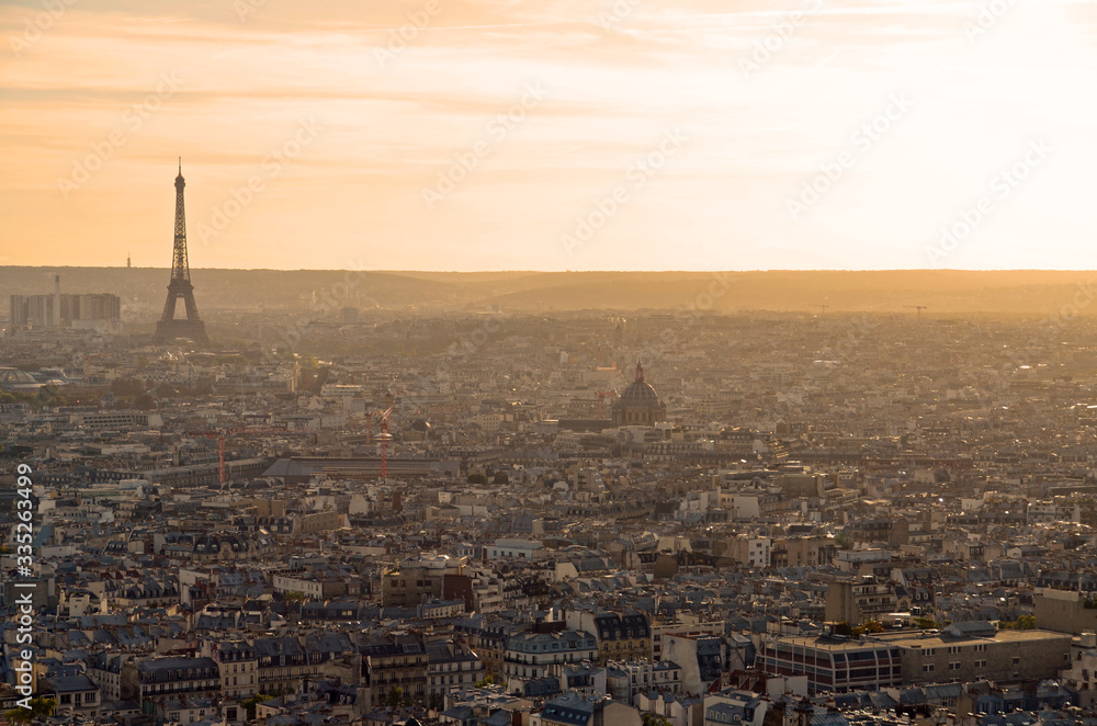Paris cityscape at sunset with golden panorama view 
