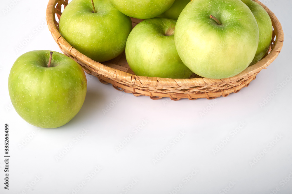 Perfect fresh green Apple with lemon isolated on a white background in full depth of field with a cropped trajectory. Perfect fresh green Apple with lemon isolated on a white background in full depth of field with a cropped trajectory.