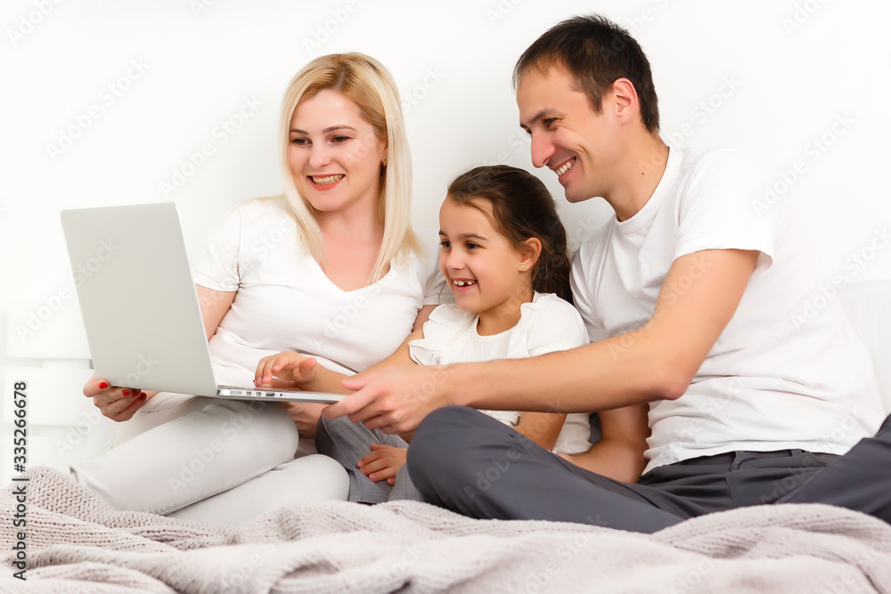 Animated family buying online lying down on bed at home Animated family buying online lying down on bed at home