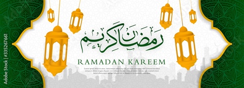 ramadan kareem islamic banner design with calligraphy and arabic lantern photo