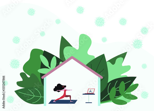 Woman doing yoga exercises at home on Quarantine with video lesson. Stay home, Stop COVID-19, 2019-nCoV Novel Corona virus