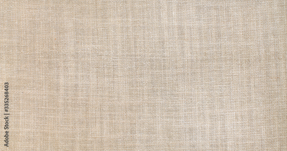 Natural linen material textile canvas texture background Natural linen material textile canvas texture background
