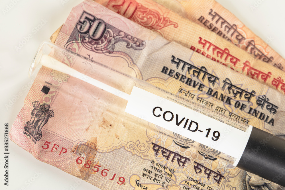 concept of crisis in India caused by virus, test on banknote concept of crisis in India caused by virus, test on banknote