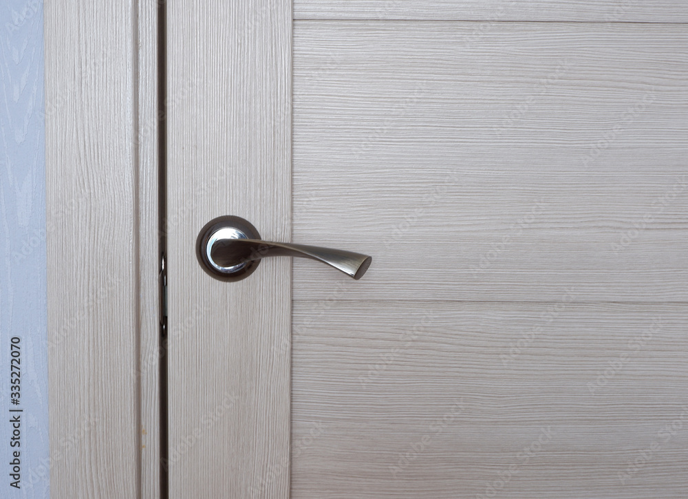 Stylish door handle in the room. Interior design. Stylish door handle in the room. Interior design.