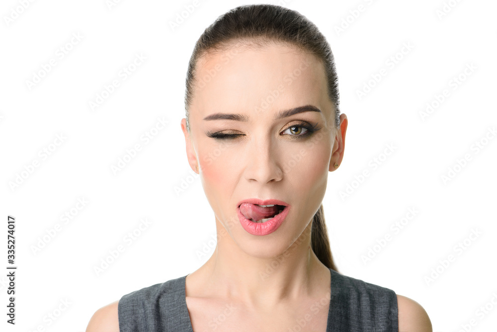beautiful girl winking and showing tongue beautiful girl winking and showing tongue
