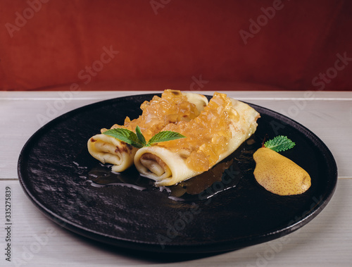 delicious desserts sweets home cooked pancakes stuffed with delicious eclairs photo