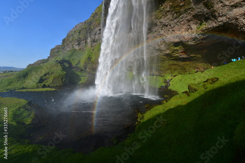 waterfall in in Iceland, with rainbow
