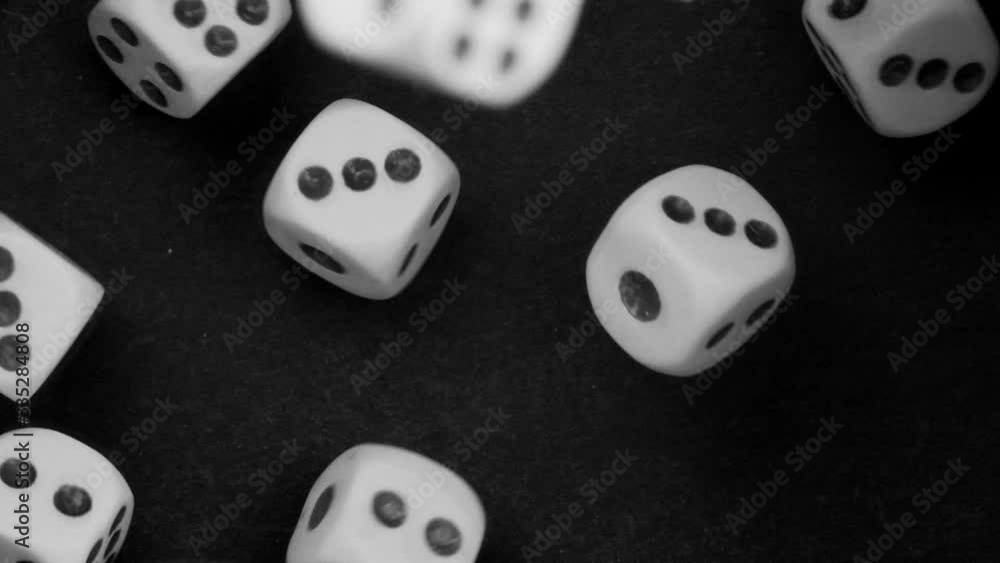 Dice dropping and bouncing in slow motion. Сlose-up. Dice dropping and bouncing in slow motion. Сlose-up.
