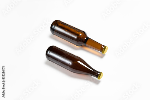 Full brown Beer Bottles Mock-up with a blank label on white background.High-resolution photo