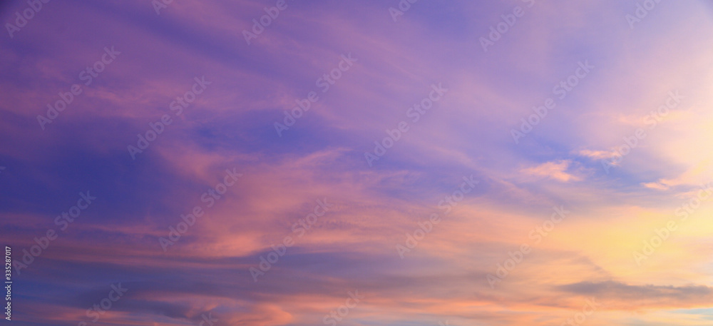 beautiful vivid color fluffy clouds in twilight sky at evening in summer.