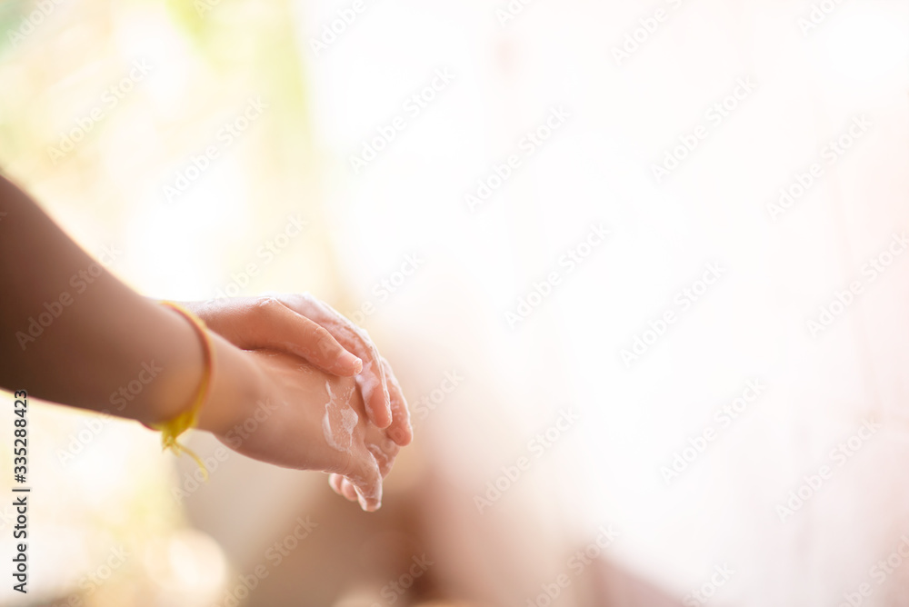 Naklejka premium Washing hands rubbing with soap women for corona virus prevention, hygiene to stop spreading coronavirus