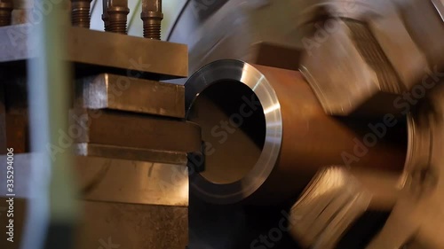 Milling parts on a professional machine at a factory in Russia