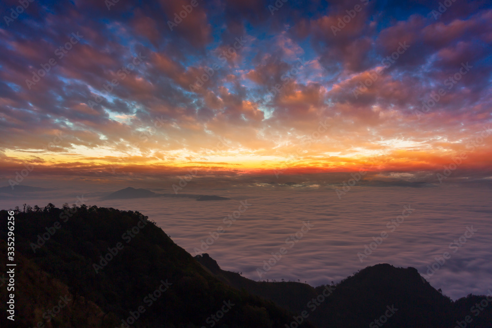 Panoramic view Sunrise and mist on mountain view at the north of thailand 