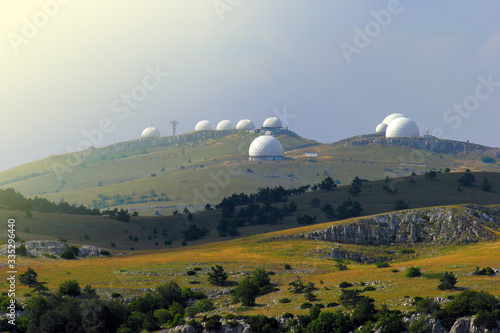 Military observation station among the mountains. Air space control and air defense program.