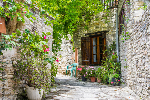 Cyprus village Lefkara. View of a village stony street with lot of green and colorful walls