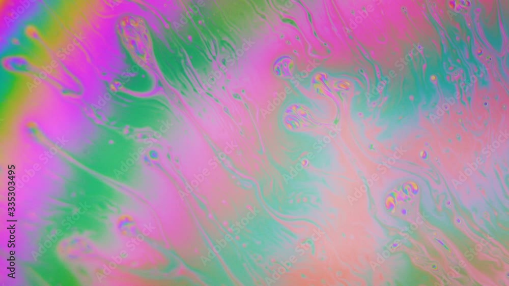 Color Drops Floating and swirling in reaction. Macro shot background Color Drops Floating and swirling in reaction. Macro shot background