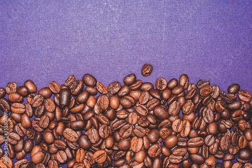 coffee beans on a blue background © Viktoriia Doroshyna