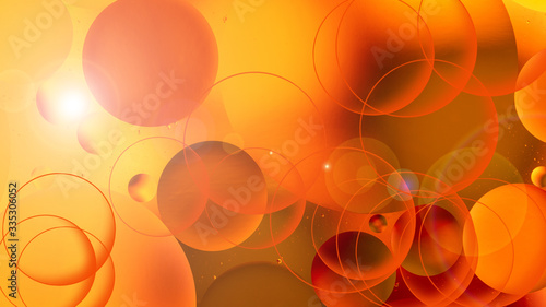  bright oily drops in water with colorful background, close-up