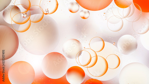bright oily drops in water with colorful background, close-up 