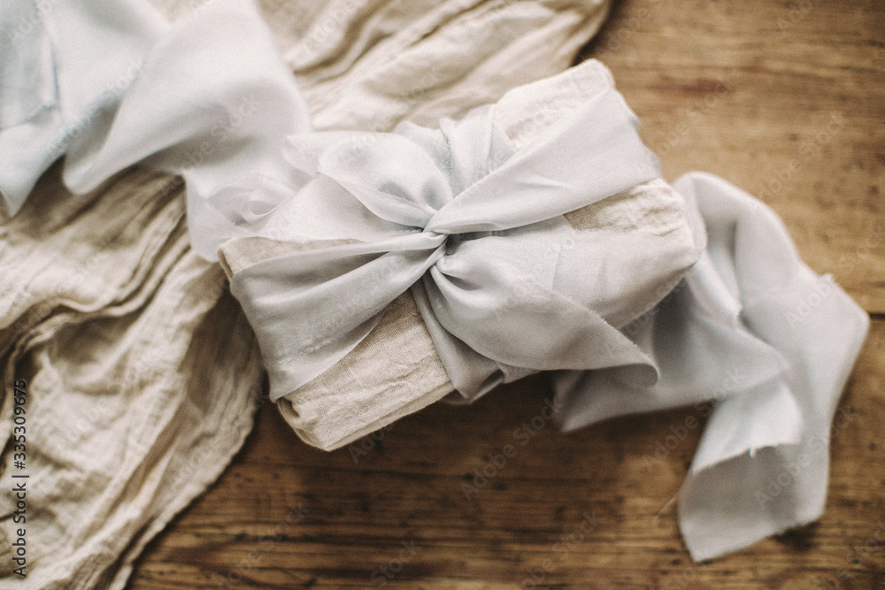white silk fabric with a bow white silk fabric with a bow