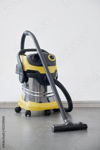 Professional vacuum cleaner in work.