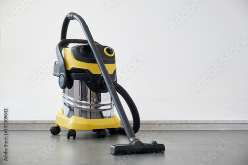 Professional vacuum cleaner in work. photo