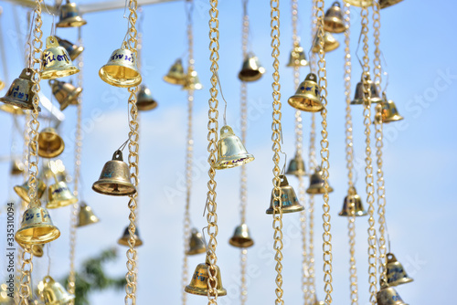 Golden bell decorated with Thai temples