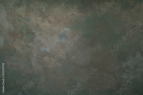 Dark olive coloured artistic canvas backdrop with stains. Abstract vintage texture.