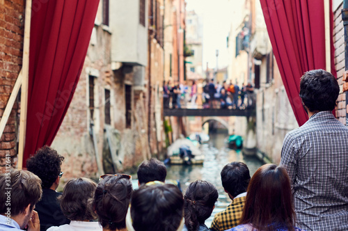Vászonkép Audience looking at outdoor show in Venice