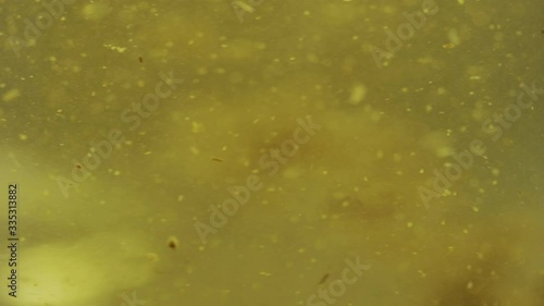 Wallpaper Mural Macro footage of kettle full of tea inside, chamomile tea Torontodigital.ca