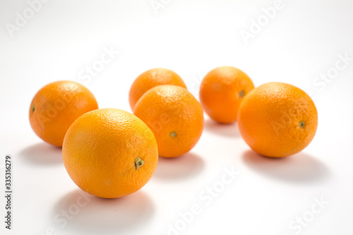 Ripe tasty orange wits slice isolated on white background.